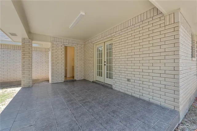 a house with trees in the background