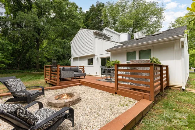 a view of a patio with couches chairs and a table