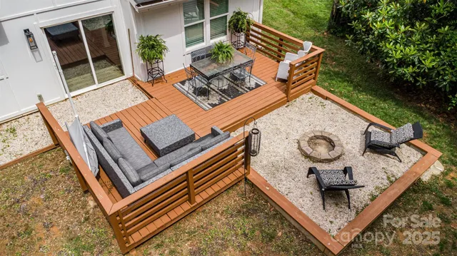 an aerial view of a house with roof deck