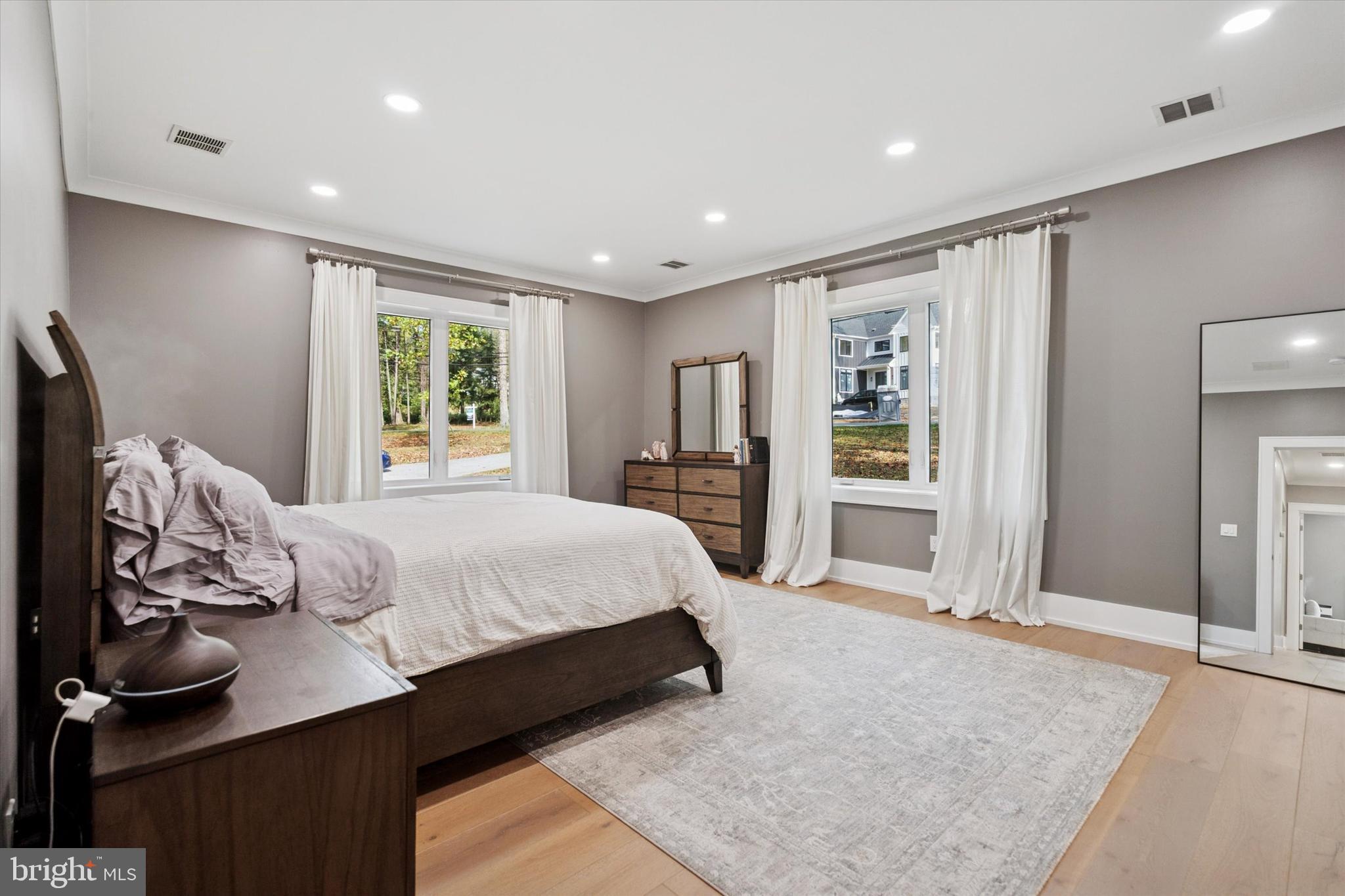 820 Darby Paoli Road Newtown Square, PA 19073 - Photo 14 of 36 a bedroom with a large bed and a window