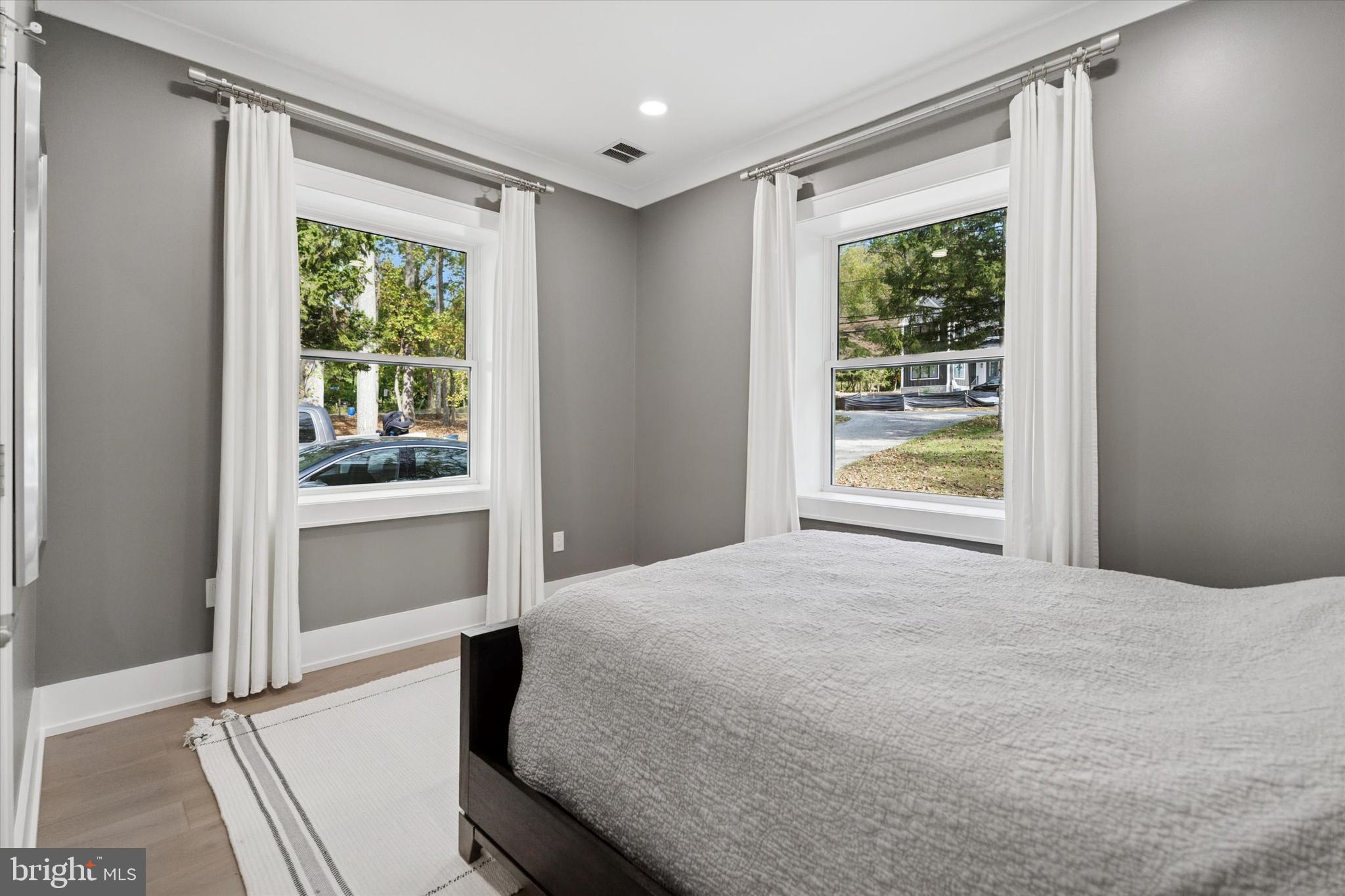 820 Darby Paoli Road Newtown Square, PA 19073 - Photo 23 of 36 a bedroom with a bed and a window