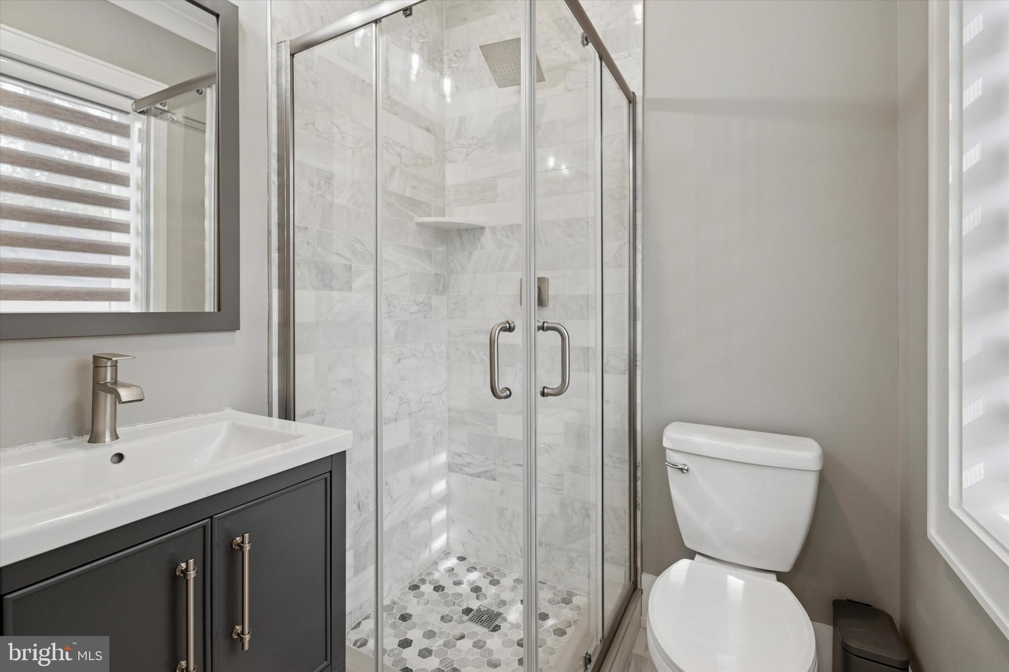 820 Darby Paoli Road Newtown Square, PA 19073 - Photo 29 of 36 a bathroom with a toilet sink and shower