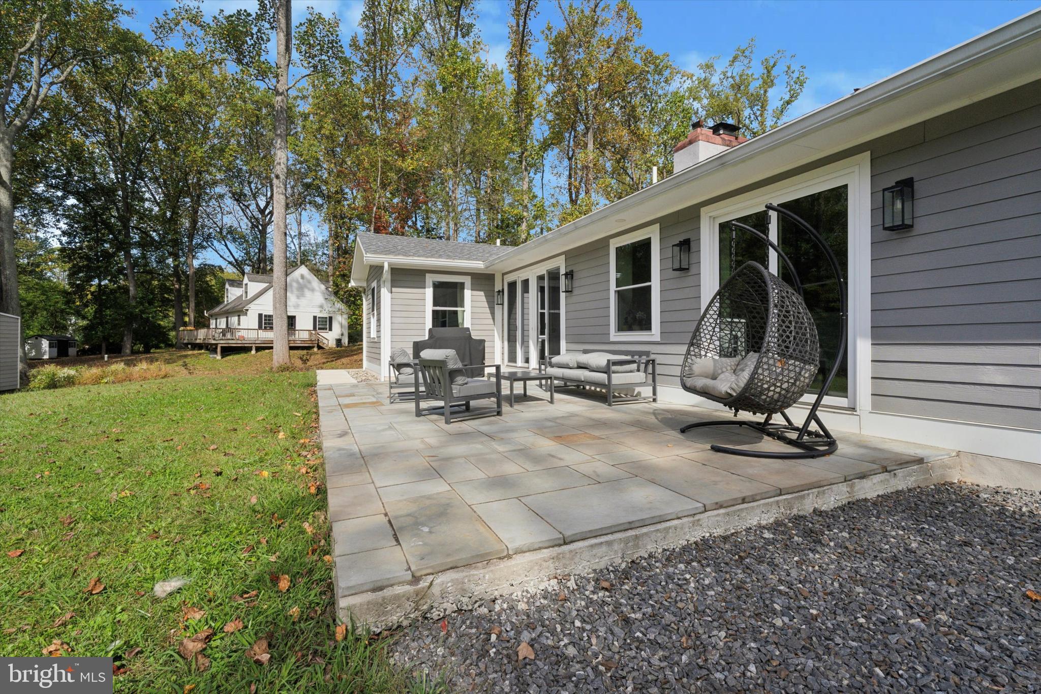 820 Darby Paoli Road Newtown Square, PA 19073 - Photo 30 of 36 a view of a house with backyard porch and garden