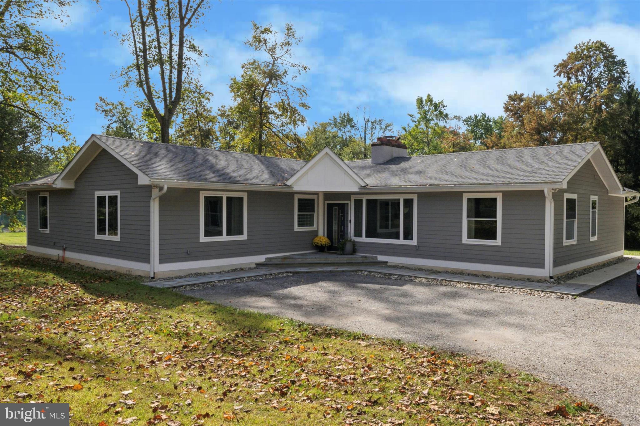 820 Darby Paoli Road Newtown Square, PA 19073 - Photo 36 of 36 a front view of a house with a garden