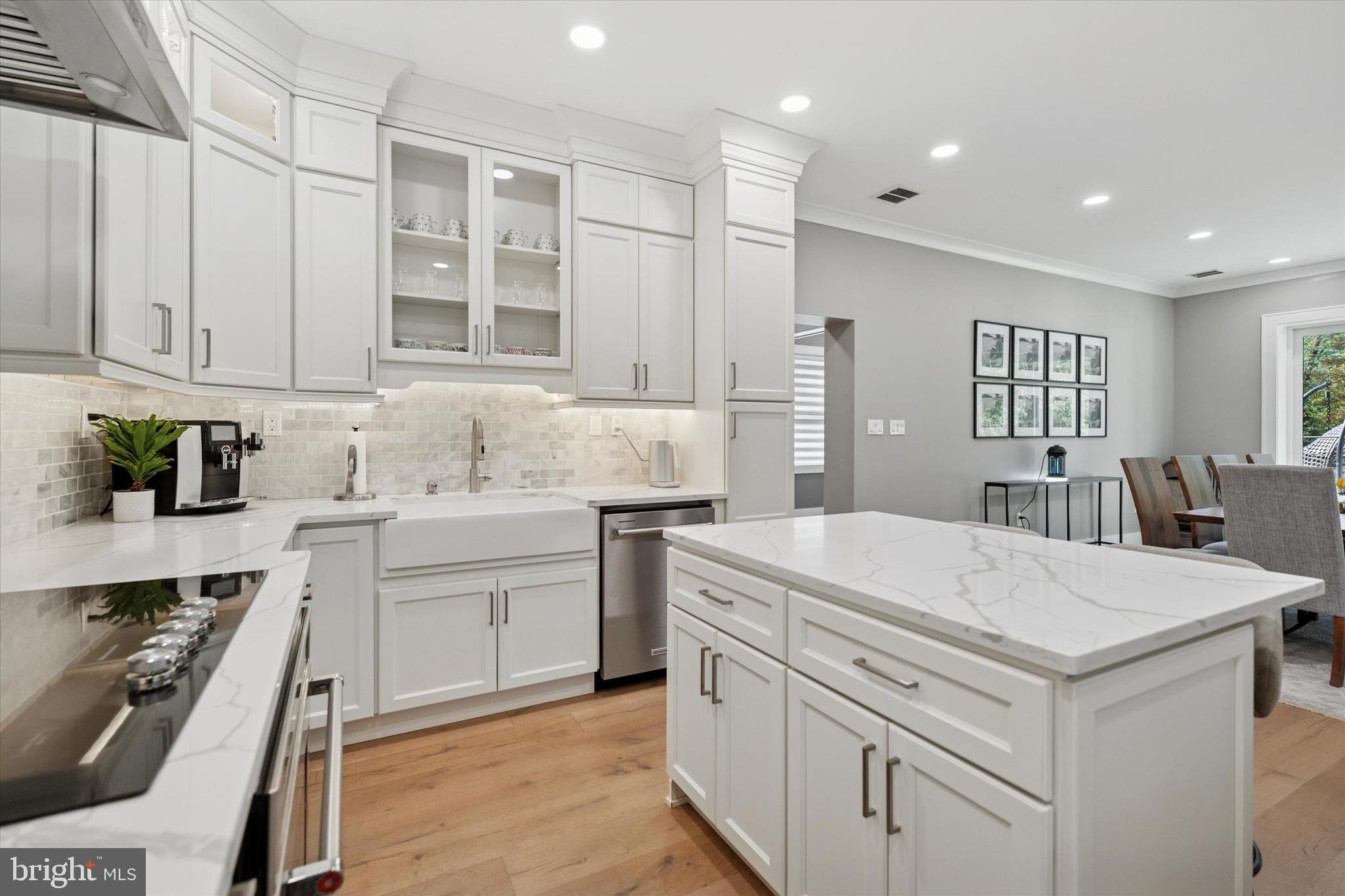 820 Darby Paoli Road Newtown Square, PA 19073 - Photo 9 of 36 a kitchen that has a lot of white cabinets and stainless steel appliances