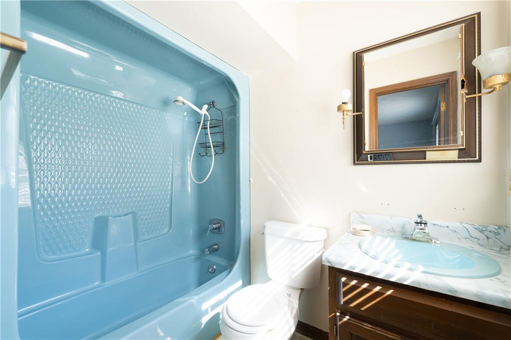838 Pleasant Hope Road Southeast Silver Creek, GA 30173 - Photo 17 of 30 a bathroom with a granite countertop sink toilet and shower