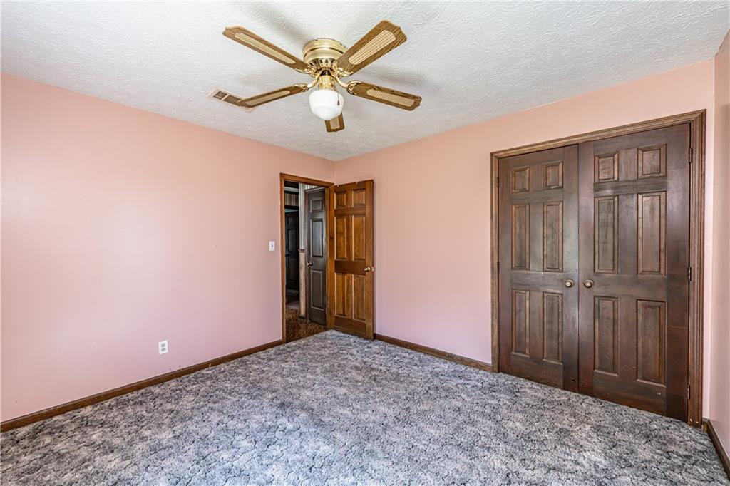 838 Pleasant Hope Road Southeast Silver Creek, GA 30173 - Photo 18 of 30 a view of an empty room