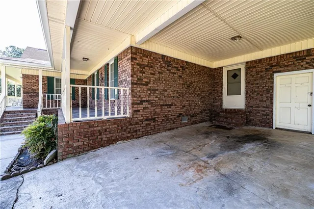 a view of entrance gate of a house