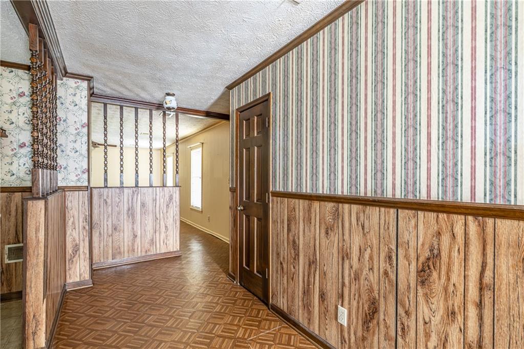 838 Pleasant Hope Road Southeast Silver Creek, GA 30173 - Photo 7 of 30 a view of an entryway with wooden floor