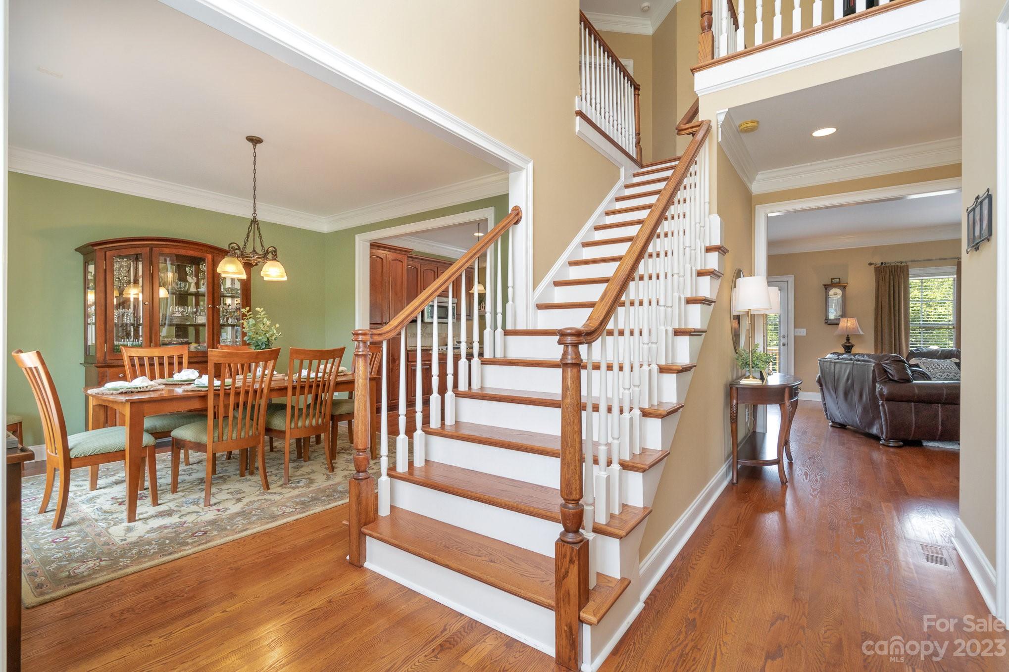 4502 Gold Hill Road Concord, NC 28025 - Photo 5 of 48 a dining room with furniture entryway and wooden floor