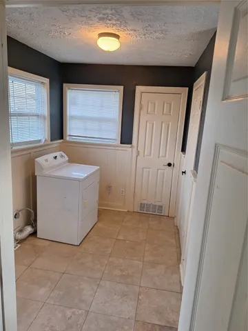 a bathroom with a sink a mirror and a bathtub