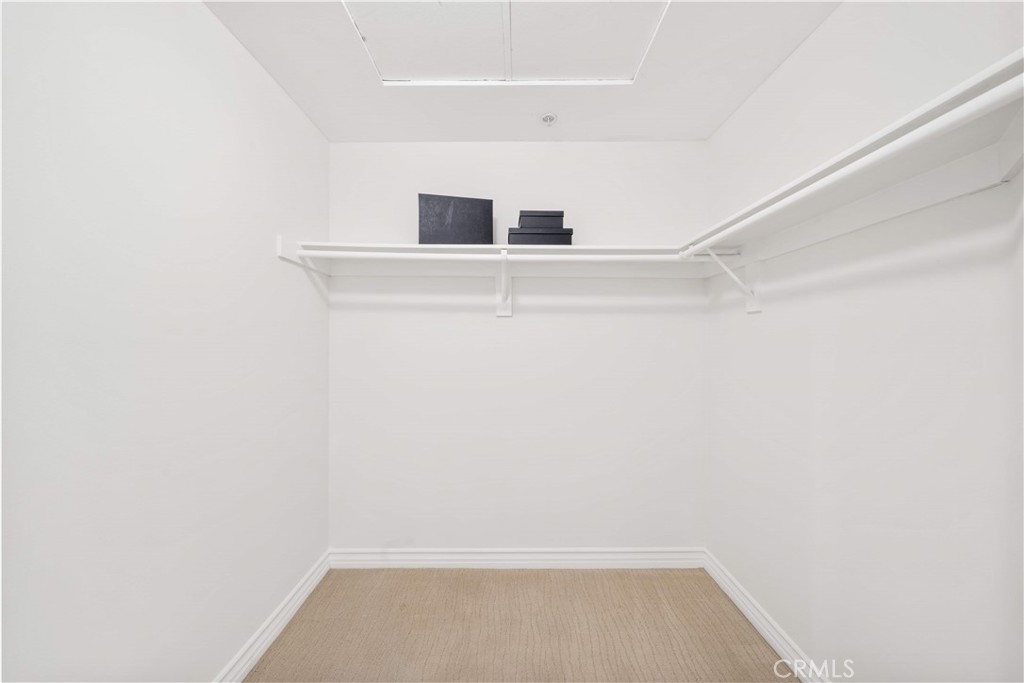 2233 Martin, Unit 204 Irvine, CA 92612 - Photo 23 of 41 a view of storage and utility room with washer and dryer