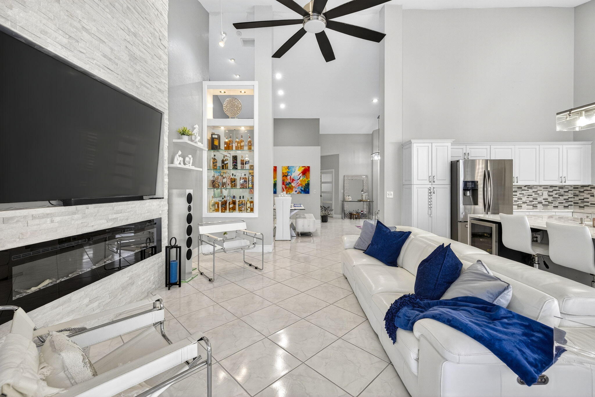 8337 Horseshoe Bay Road Boynton Beach, FL 33472 - Photo 13 of 55 a living room with furniture and a flat screen tv
