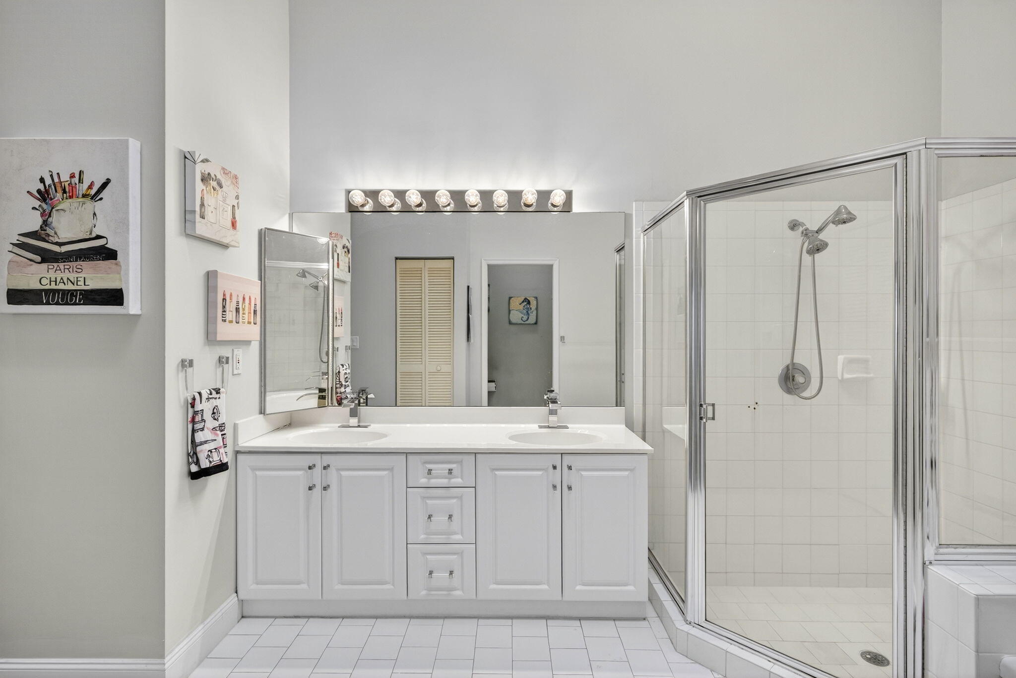 8337 Horseshoe Bay Road Boynton Beach, FL 33472 - Photo 26 of 55 a spacious bathroom with a shower sink and mirror