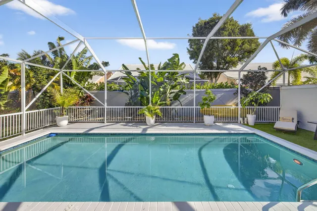 a view of a chairs and table in the patio