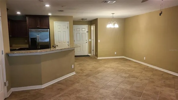 a view of a kitchen with a sink
