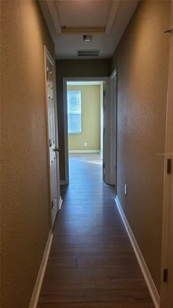 a bathroom with a toilet and a bath tub