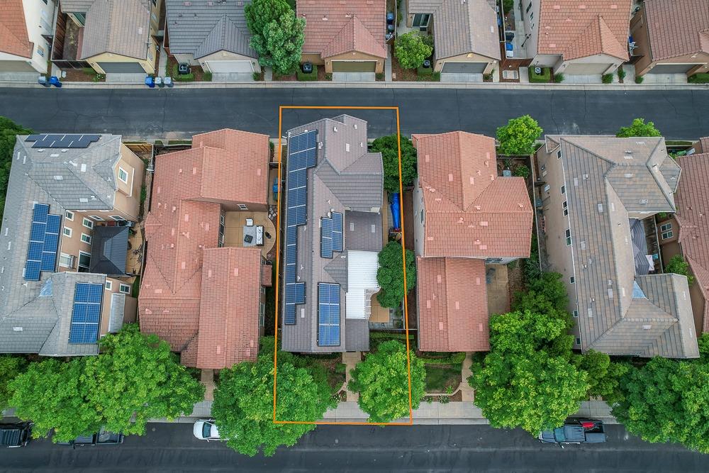 3852 Harlan Ranch Boulevard Clovis, CA 93619 - Photo 39 of 45 an aerial view of a house with a yard and a bench