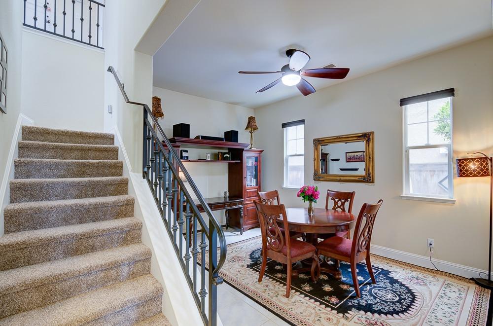 3852 Harlan Ranch Boulevard Clovis, CA 93619 - Photo 10 of 45 a view of a dining room with furniture