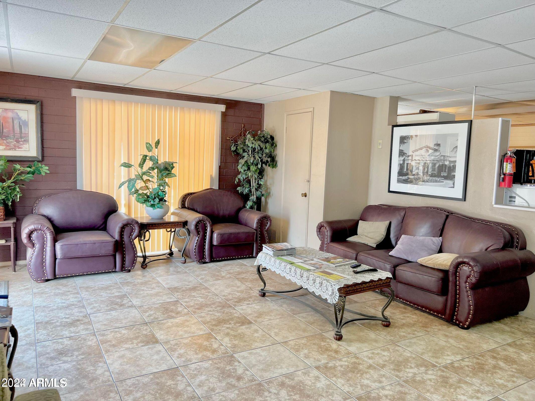 16005 North 32nd Street, Unit 31 Phoenix, AZ 85032 - Photo 45 of 48 a living room with furniture and a large window