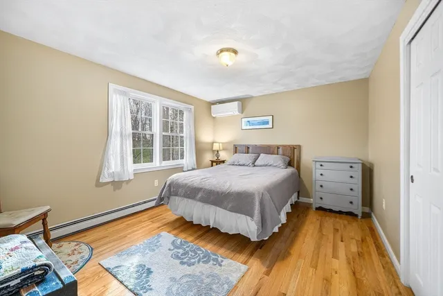 a view of a workspace with furniture and a workspace