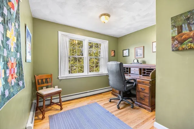 a aerial view of a house with a yard