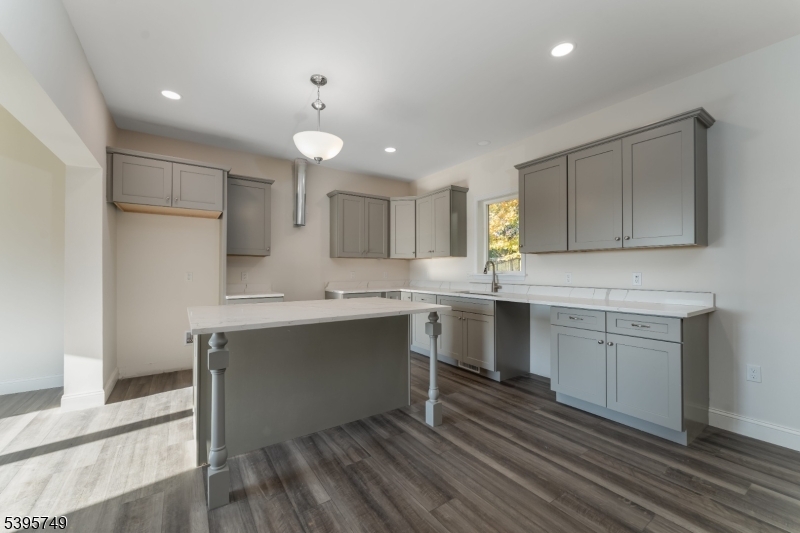 9 Heather Hill Road Washington, NJ 07882 - Photo 11 of 29 a kitchen with white cabinets appliances and a sink