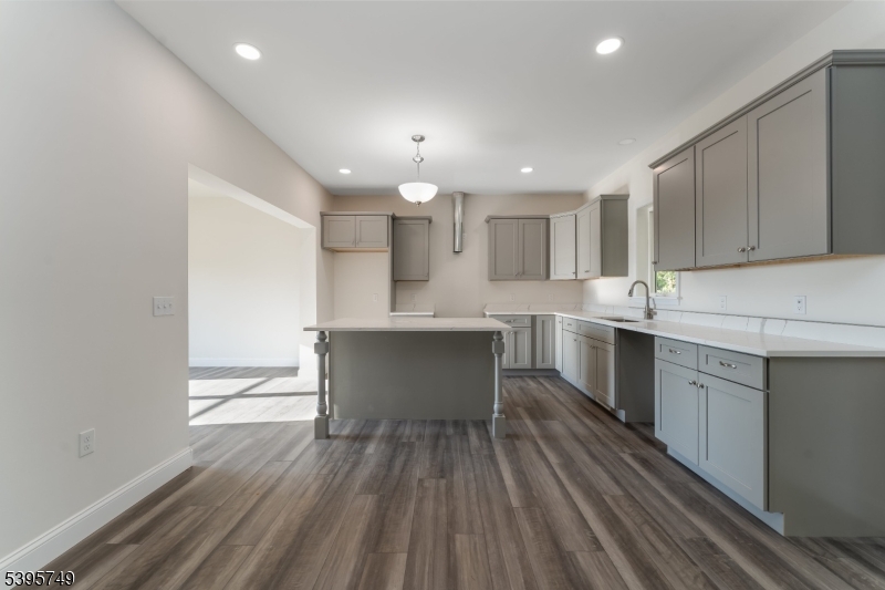 9 Heather Hill Road Washington, NJ 07882 - Photo 13 of 29 a kitchen with kitchen island cabinets and wooden floor