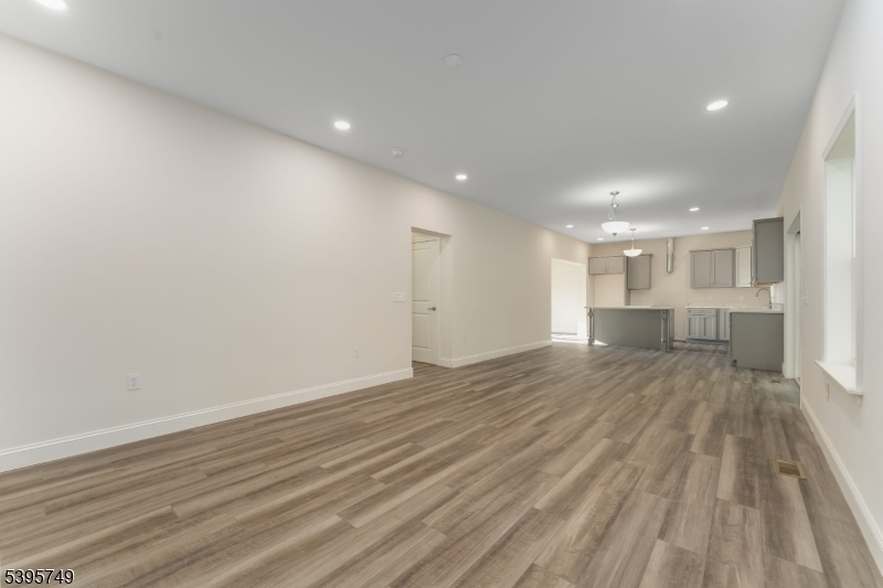 9 Heather Hill Road Washington, NJ 07882 - Photo 17 of 29 a view of empty room with wooden floor