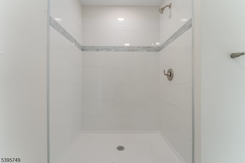 9 Heather Hill Road Washington, NJ 07882 - Photo 23 of 29 a bathroom with a shower
