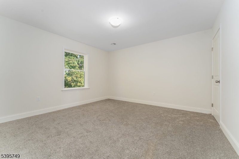9 Heather Hill Road Washington, NJ 07882 - Photo 25 of 29 an empty room with a window
