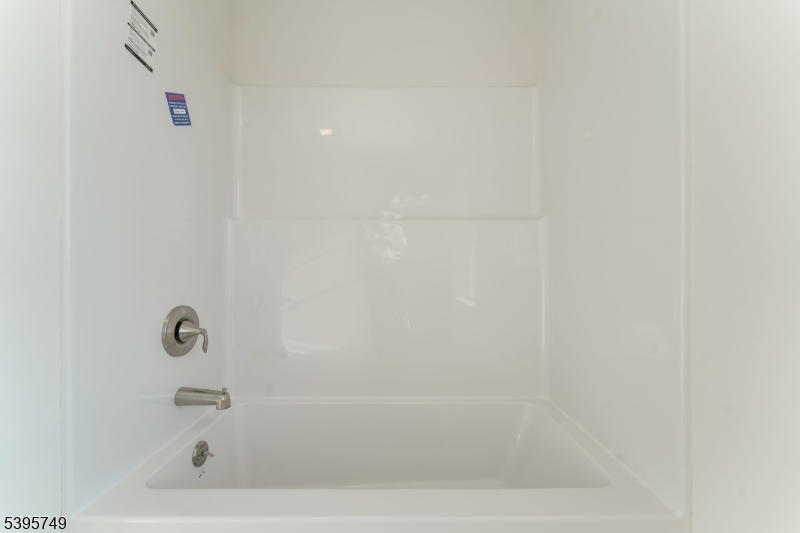 9 Heather Hill Road Washington, NJ 07882 - Photo 27 of 29 a bathroom with a bathtub