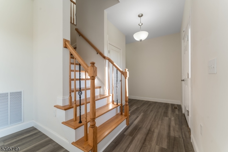 9 Heather Hill Road Washington, NJ 07882 - Photo 5 of 29 a view of entryway with stairs and wooden floor