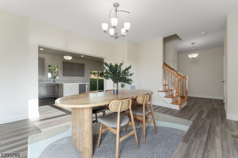 9 Heather Hill Road Washington, NJ 07882 - Photo 10 of 29 a view of a dining room with furniture and wooden floor