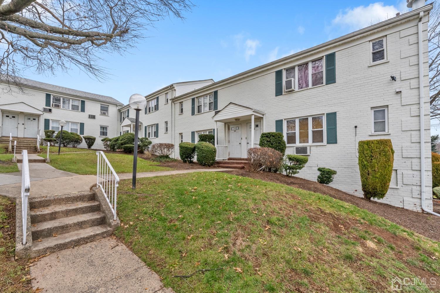 22B Garfield Park, Unit A Edison, NJ 08837 - Photo 24 of 36 a view of a house with backyard porch and sitting area