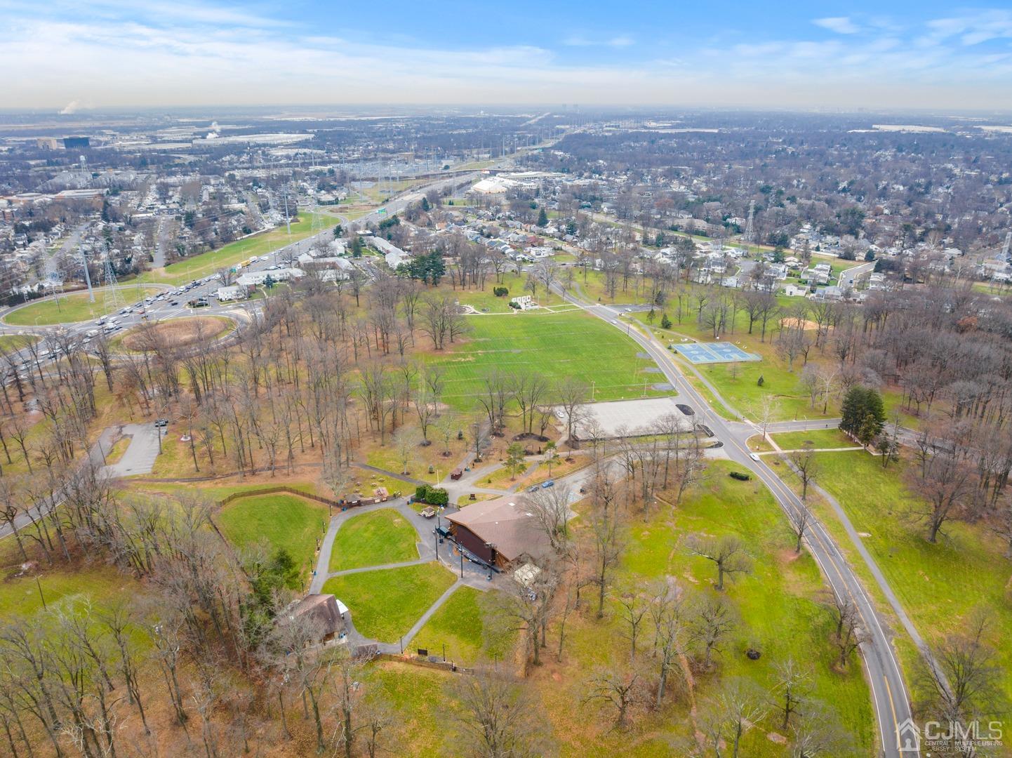 22B Garfield Park, Unit A Edison, NJ 08837 - Photo 35 of 36 an aerial view of residential houses with outdoor space and swimming pool