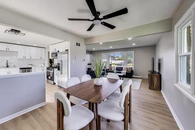 a view of a dining room with furniture