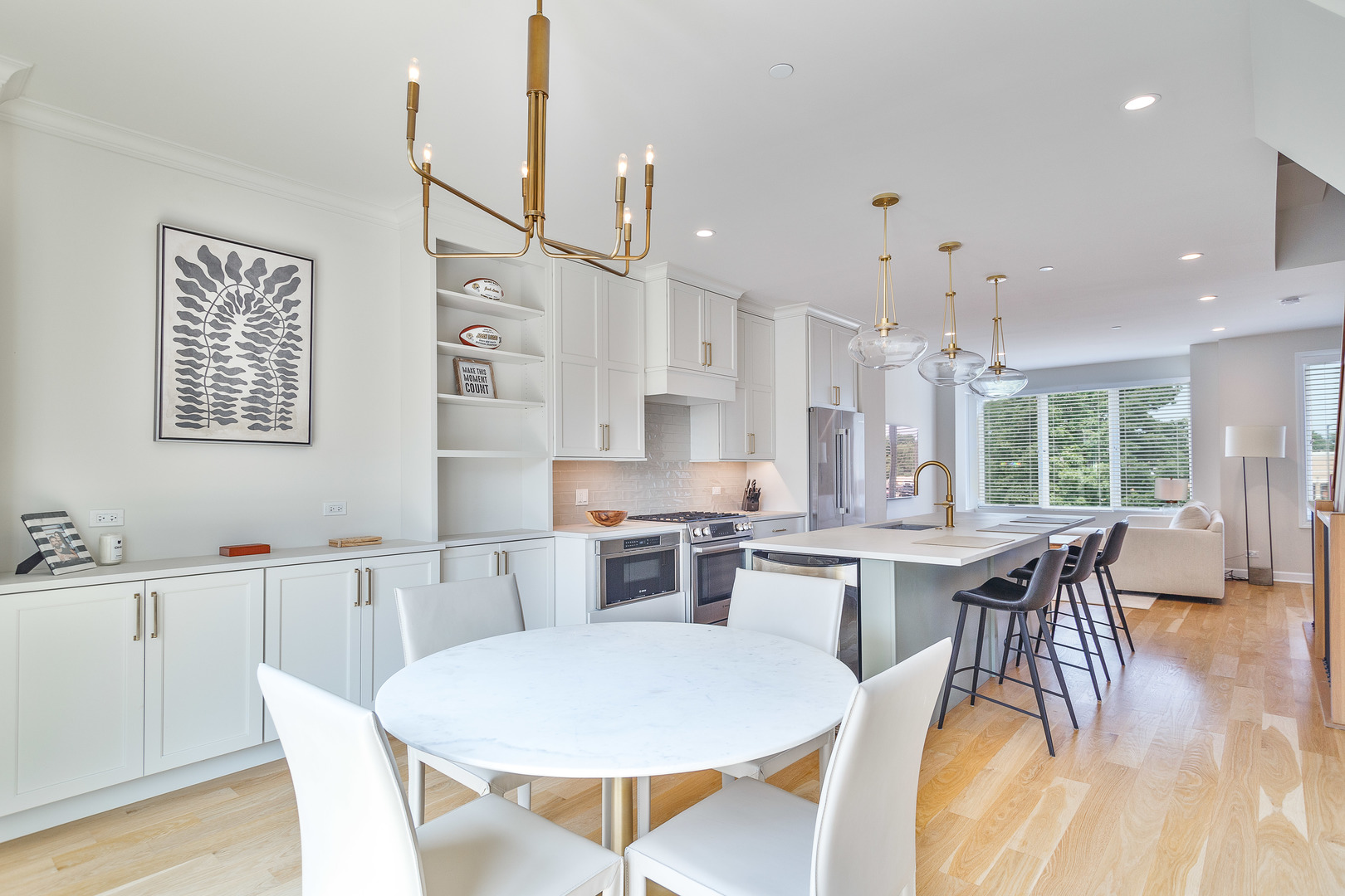 1263 Shermer Road Northbrook, IL 60062 - Photo 11 of 33 a large kitchen with a table and chairs