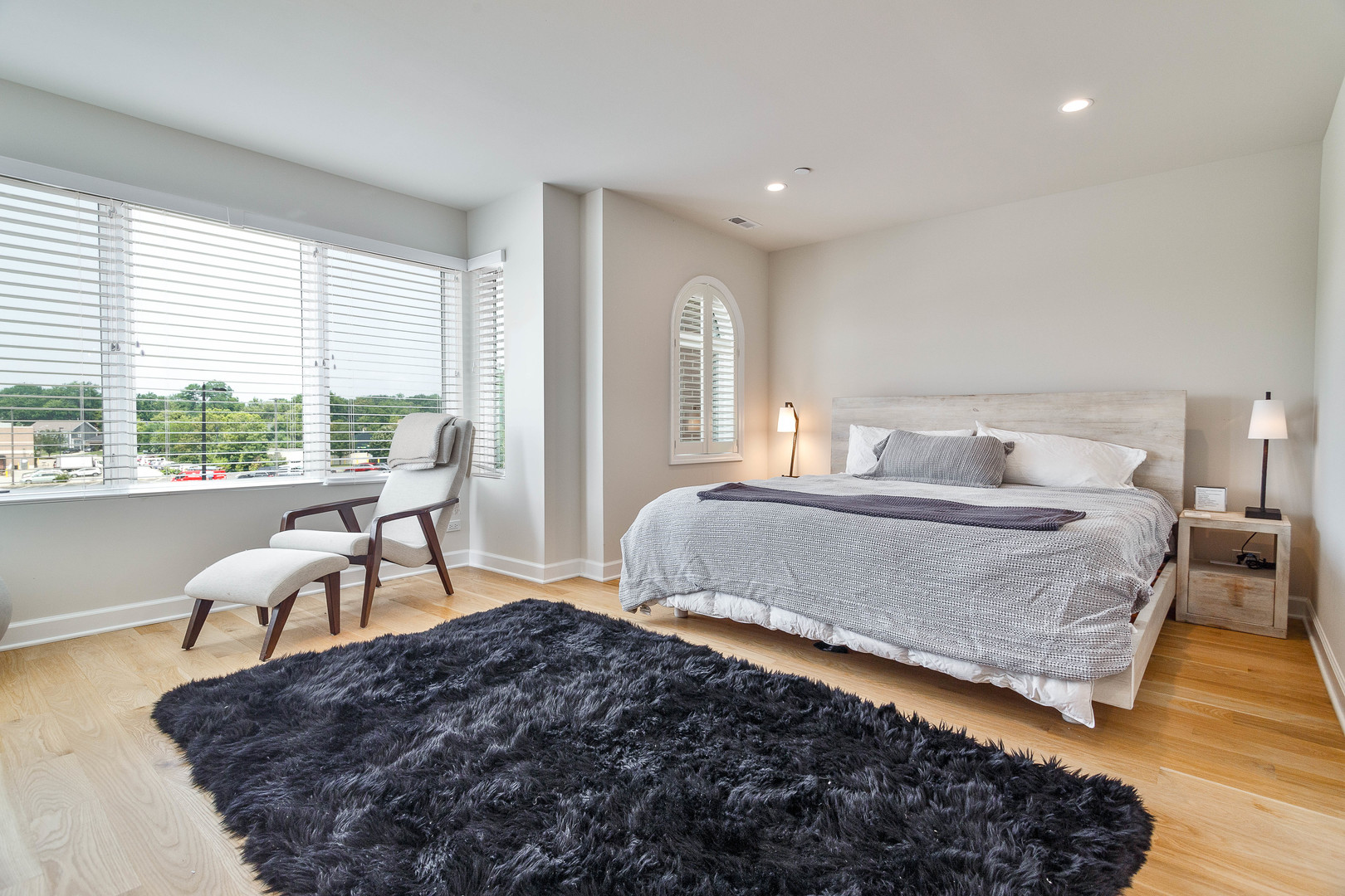 1263 Shermer Road Northbrook, IL 60062 - Photo 17 of 33 a bedroom with bed and a large window