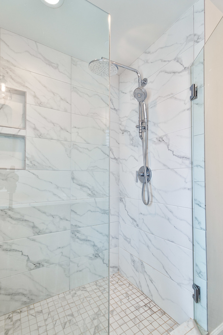 1263 Shermer Road Northbrook, IL 60062 - Photo 22 of 33 a bathroom with a shower