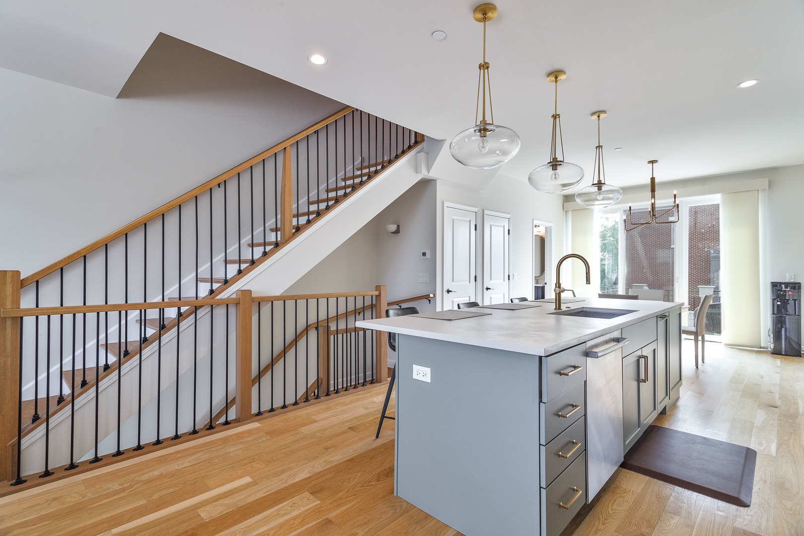 1263 Shermer Road Northbrook, IL 60062 - Photo 7 of 33 a kitchen with kitchen island a sink and a wooden floor