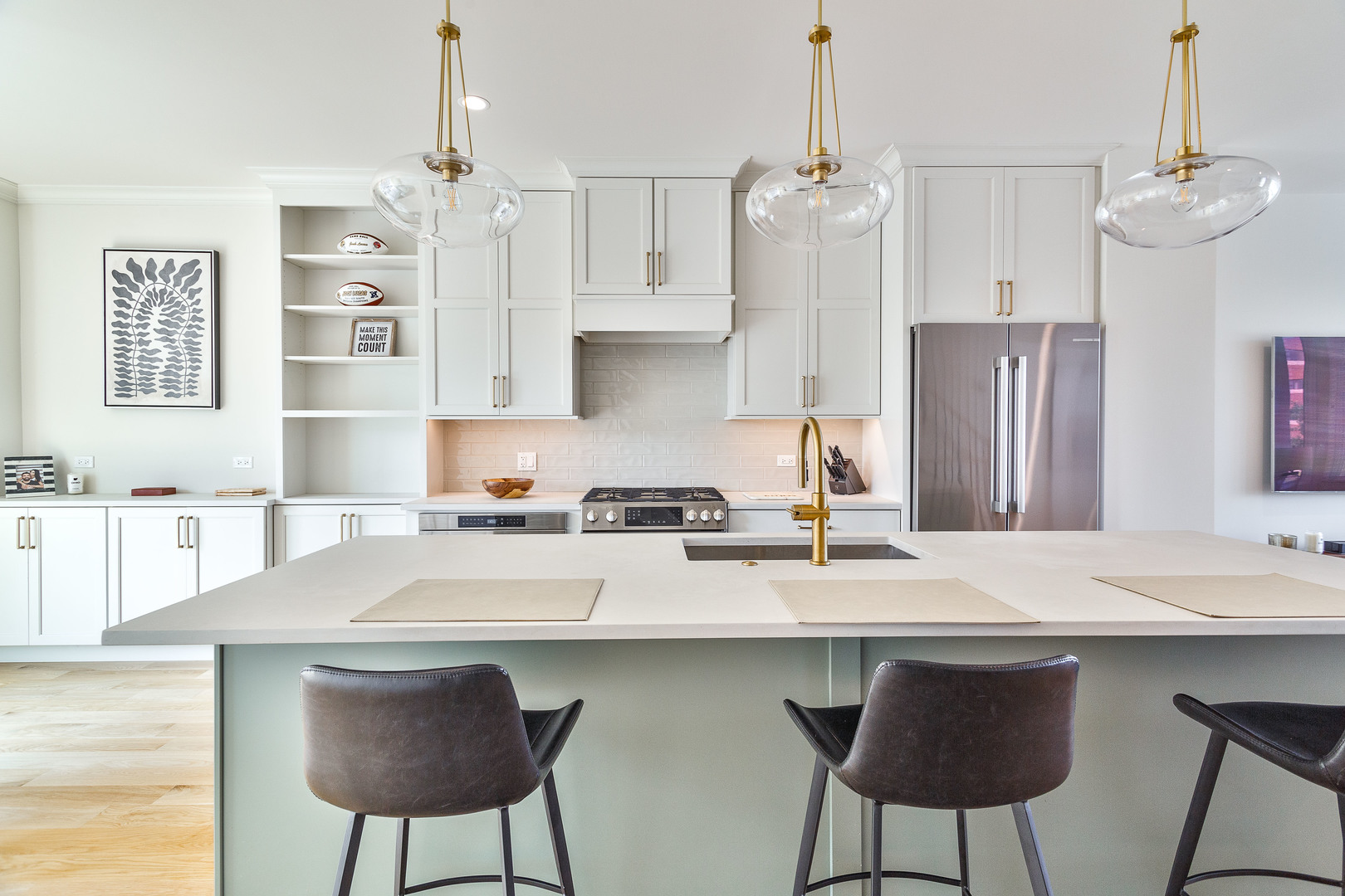1263 Shermer Road Northbrook, IL 60062 - Photo 8 of 33 a kitchen with stainless steel appliances chandelier a refrigerator and a stove