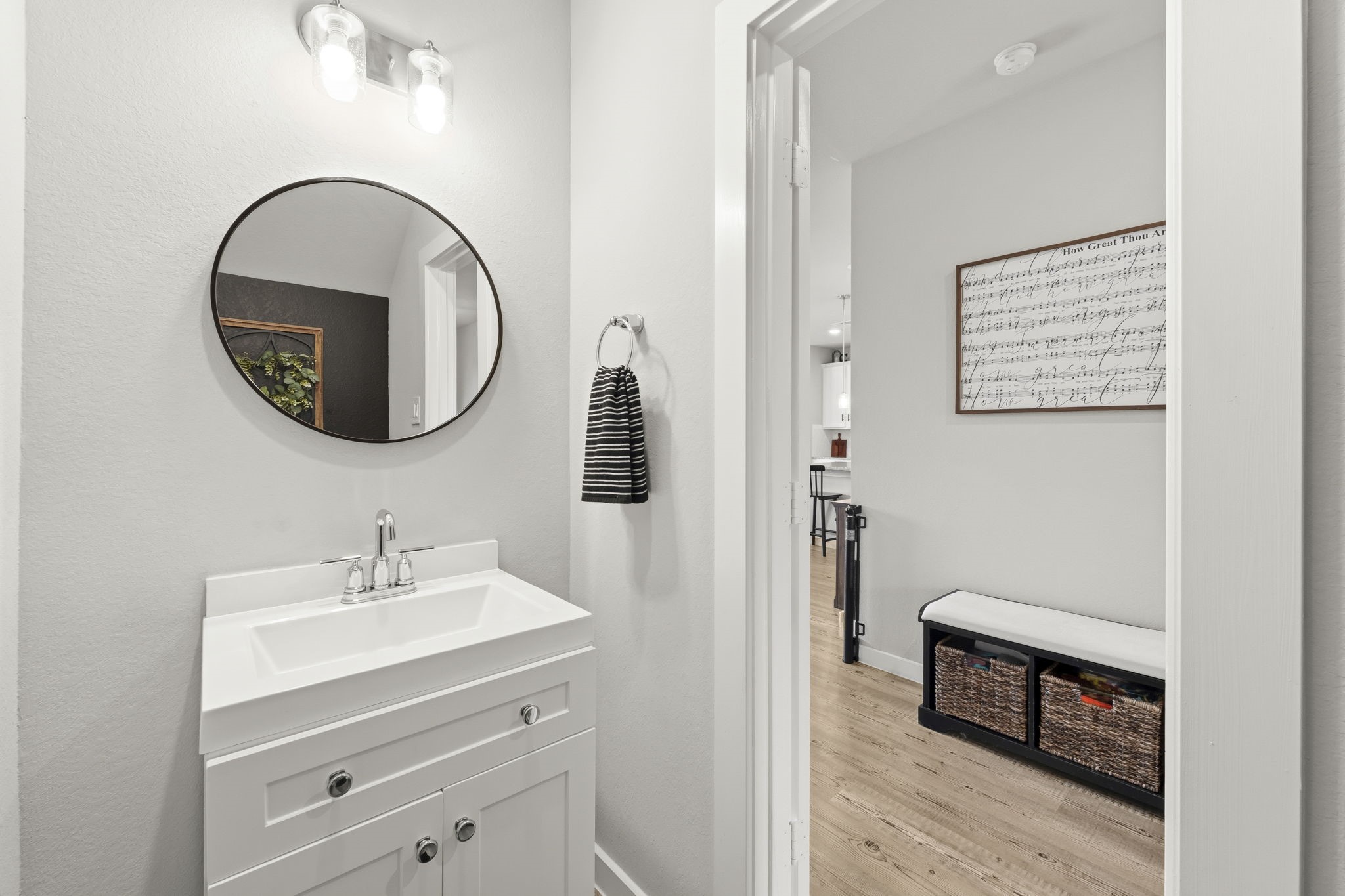 17696 Tree Of Heaven Conroe, TX 77385 - Photo 22 of 32 The powder room features an updated vanity and mirror.