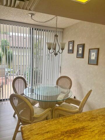 4746 South Ocean Boulevard, Unit 3 Highland Beach, FL 33487 - Photo 4 of 8 a room with furniture