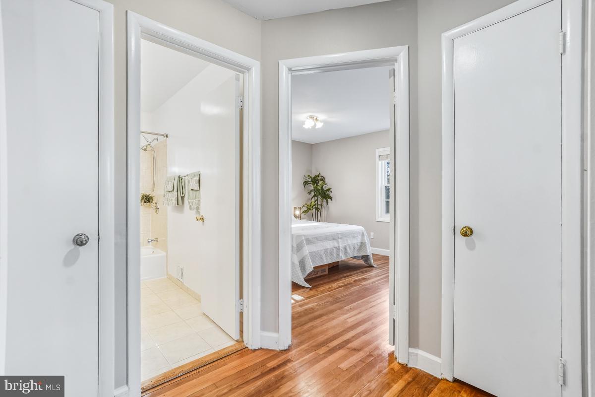 1021 Brice Road Rockville, MD 20852 - Photo 18 of 44 a view of a bathroom from a hallway