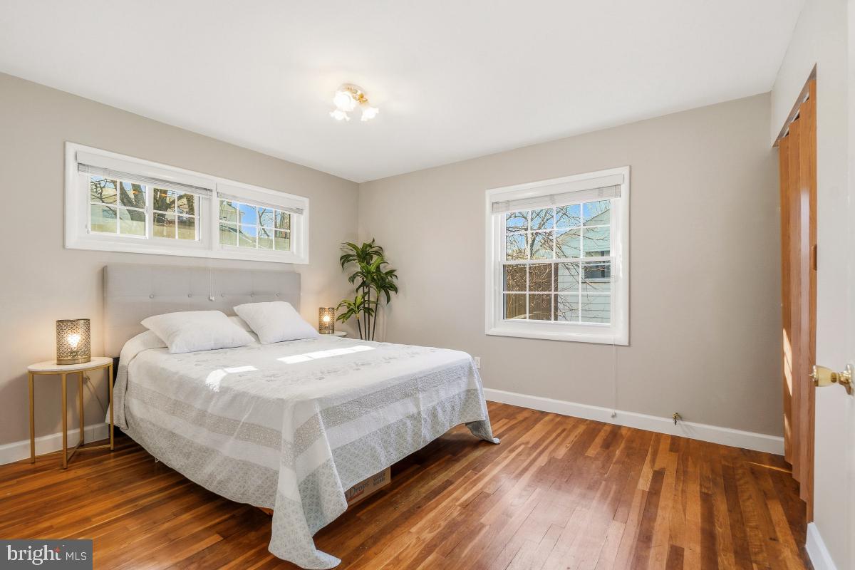 1021 Brice Road Rockville, MD 20852 - Photo 19 of 44 a bedroom with a bed and window