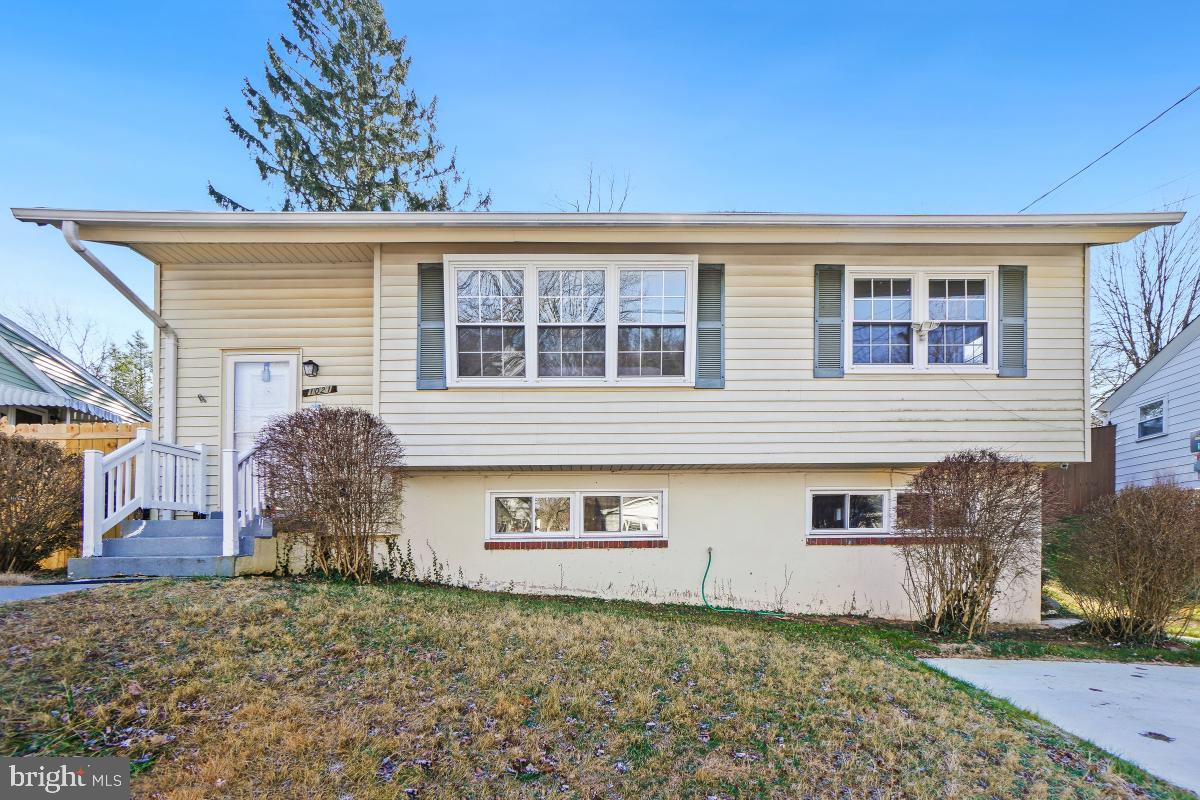 1021 Brice Road Rockville, MD 20852 - Photo 2 of 44 front view of a house with a yard