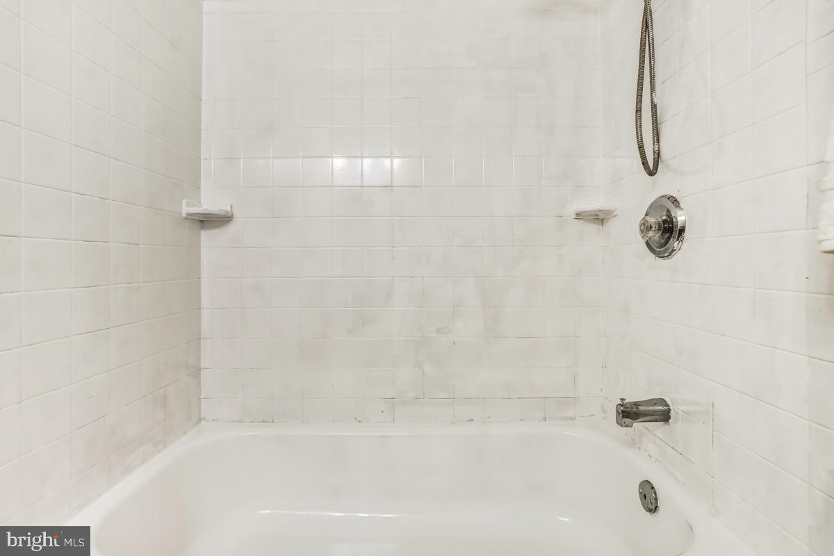 1021 Brice Road Rockville, MD 20852 - Photo 38 of 44 a bathroom with a bathtub