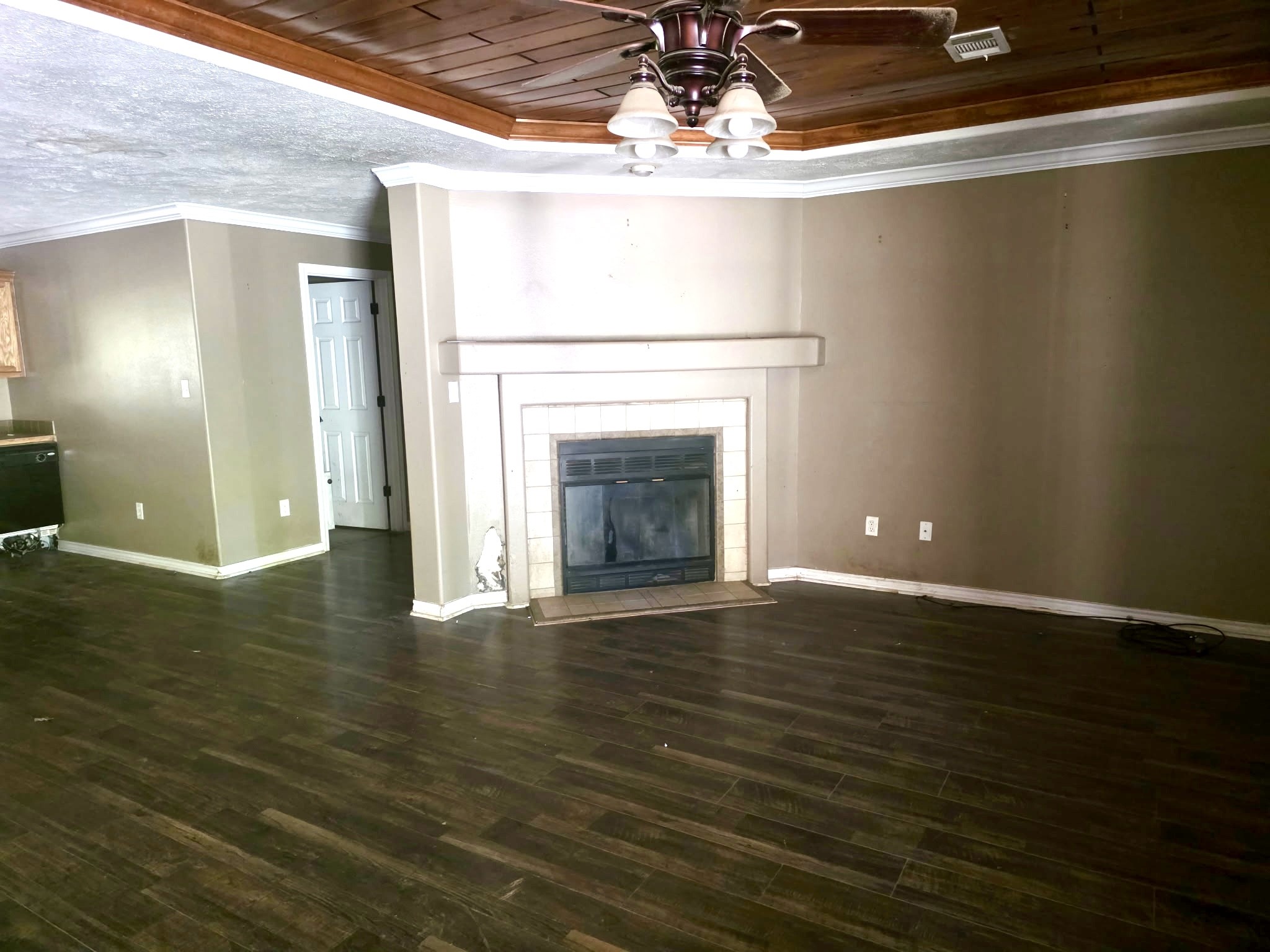 633 Ira Denson Road Coldspring, TX 77331 - Photo 27 of 27 a view of an empty room with wooden floor