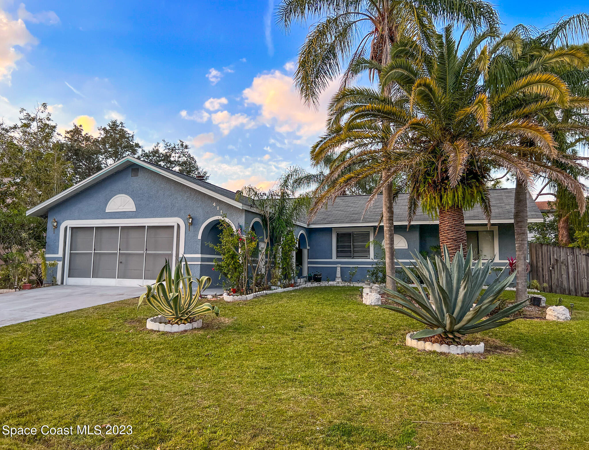 411 Trier Road Northwest Palm Bay, FL 32907 - Photo 1 of 24 Front